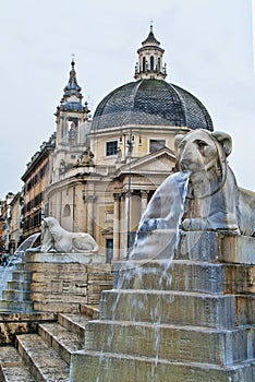 The lion fountain in Piazza del Popolo, Rome, italy