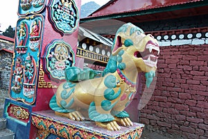 Lion at the gate of Tengboche Buddhist monastery, Everest trek, Nepal photo