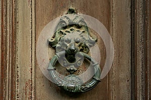 Lion head door knocker.