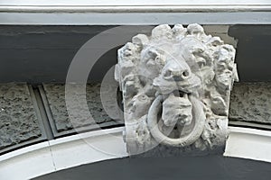 Lion head with ring in jaws of old building in Odesa Ukraine