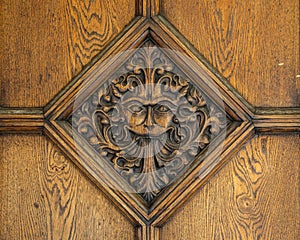 Lion-Like Carving on a Door to Brasenose College in Oxford, UK