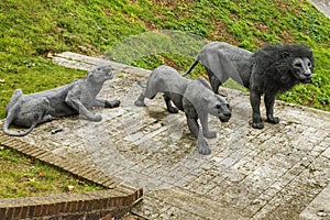 Lion and lioness sculptures