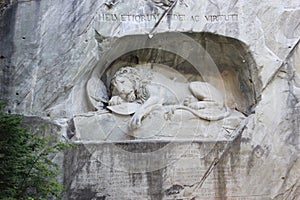 Lion of monument in Lucerne, Switzerland Inscription to commemorate for brave soldiers