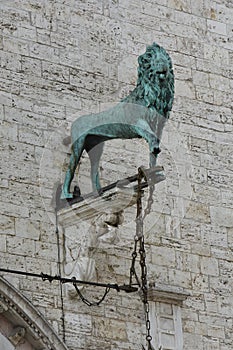 Lion , mythical creature at Palazzo dei Priori in Perugia, Umbria