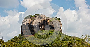 Lion Rock in Sri Lanka with blue sky and white clouds