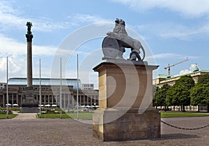 Lion sculpture with crest in front of the main entrance of the New Castle Neues Schloss in Germany, Stuttgart