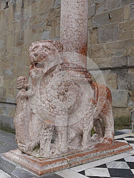 Lion sculpture at the entrance of Cappella Colleoni, Bergamo, Italy.