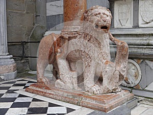 Lion sculpture at the entrance of Cappella Colleoni, Bergamo, Italy.