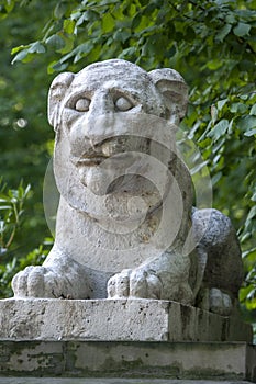 A lion sculpture within Lazienki Park at Warsaw in Poland