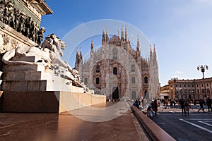 Lion sculpture and Milan Cathedral in Milan, Italy