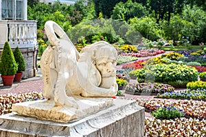 Lion sculpture in private garden of Pavlovsky park, Saint Petersburg, Russia