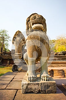 Lion or Singha and Naga sandstone statue in Prasat Hin Phimai