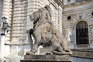 Lion statue at Hofburg palace on Heldenplatz square in Vienna, Austria