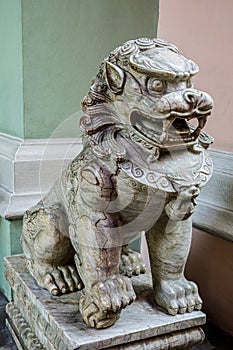 Lion statue outside a temple in China, East Asia