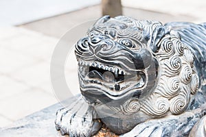 Lion Statue at Shaolin Temple in Dengfeng, Henan, China. It is part of UNESCO World Heritage Site - Historic Monuments of Dengfeng