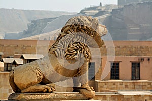 Lion statue at the walls of The Citadel of Cairo or Citadel of Saladin, a medieval Islamic-era fortification in Cairo, Egypt,