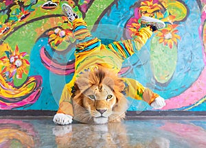 Lion Teenager B-Boying with Multi-colored Gravity in the Backdrop
