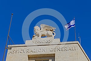 Lion on top of the building at Ha-Shoter Square on the Jaffa street in Jerusalem photo