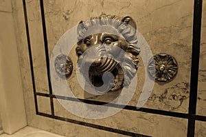 Lion water fountain on the wall at New York City public library, Manhattan, New York City, USA