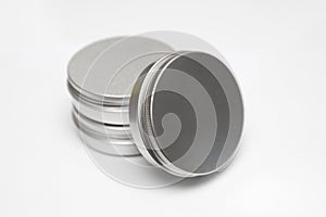 Lip balm in metallic tins