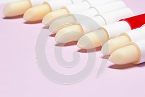 Lip balms row with copy space