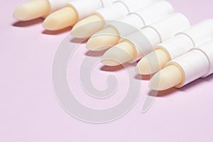 Lip balms row with copy space