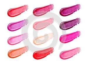 Lip gloss face make-up samples palette. Set of colorful cosmetic liquid lipgloss in different colour smudge smear strokes