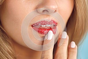 Lip Skin Care. Beautiful Woman Lips With Sugar Lip Scrub On