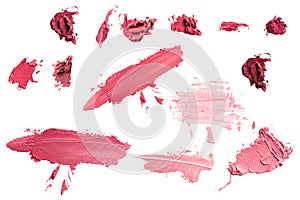 Lip stick texture. Lipstick different colors, shades options. Traces on a white isolated background from pink and red flowers