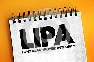 LIPA - Long Island Power Authority acronym text on notepad, abbreviation concept background