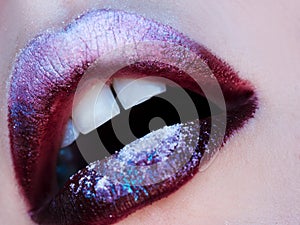 Lips, art make-up with shadows and Shine. Close-up, small depth of field