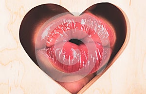 Lips in heart shape. Valentines day concept. Girl kiss. Female lips kissing. Natural beauty lip care. Sensual womens