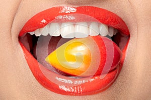 Lips Makeup. Lips With Colored Lipstick And Sweets.