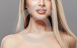 Lips neck smile Blonde woman beauty portrait close-up isolated on gray