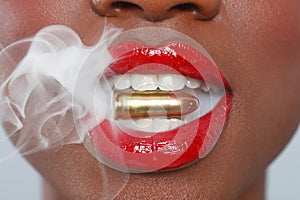 Lips of a Woman With A Bullet and Smoke