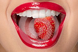 Lips. Woman With Red Lipstick And Strawberry