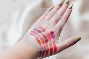 Lipstick colors on a hand