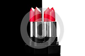 Lipstick. Fashion red Colorful Lipsticks isolated on black and white background