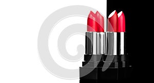 Lipstick. Fashion red Colorful Lipsticks isolated on black and white background