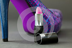 Lipstick and fashion shoe.