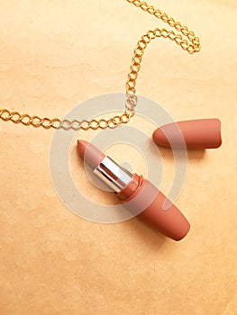 lipstick and golden chain