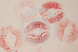 Lipstick kiss on white background. Close up of female lips