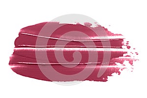 Lipstick smear smudge swatch isolated on white background. Cream makeup texture