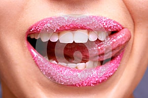 Lipstick, sugar and woman with tongue out, beauty and makeup with creativity and scrub for exfoliation treatment. Sweet