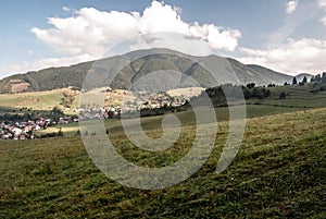 Liptovska Luzna village with hills and meadows around in Slovakia