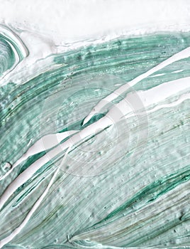 liquid acrylic, oil paint on canvas. Mix of white and green color. Fluid paintings. Stone agate jadeite texture