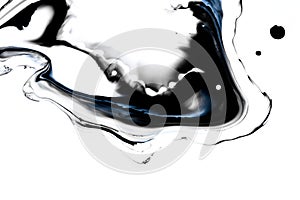 Liquid black ink in water. Marble art effect. Creative abstract artistic background.