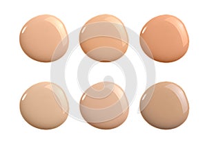 Liquid concealer cream smear smudge swatch drop isolated. Make up foundation shades sample round shape for beauty catalog