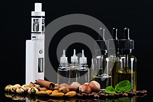 Liquid for an electronic cigarette in bubbles surrounded by nuts, cinnamon and fresh mint