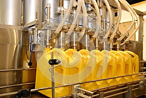 Liquid filling machines in industry plant photo